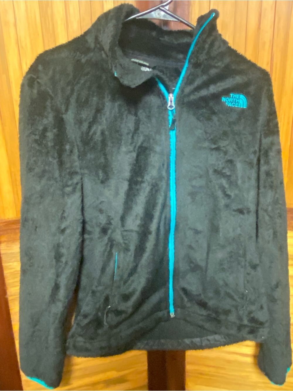 The North Face Black Fleece Jacket with Bright Teal Zipper
